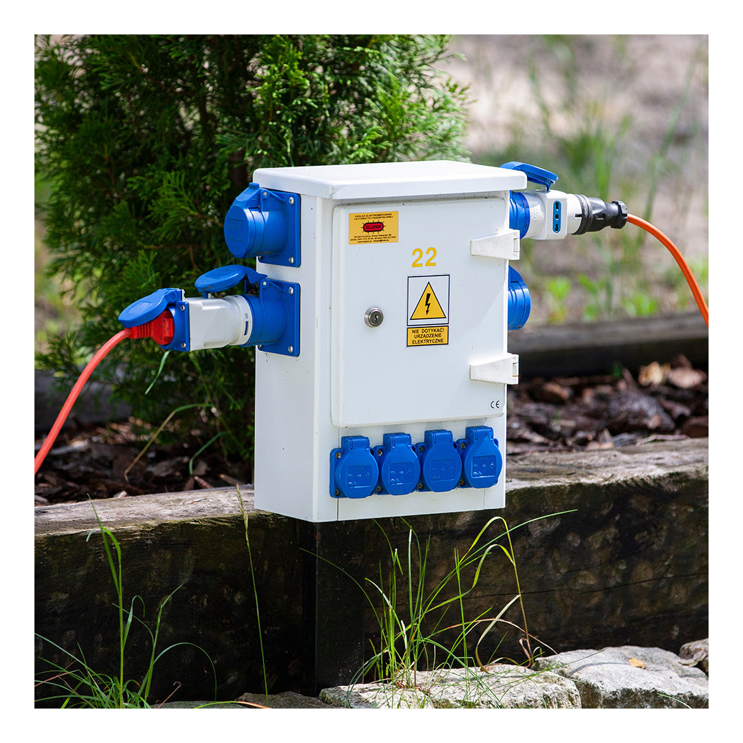 High-visibility orange 10m caravan extension cable with UK 3-pin connectors for external hook-up points