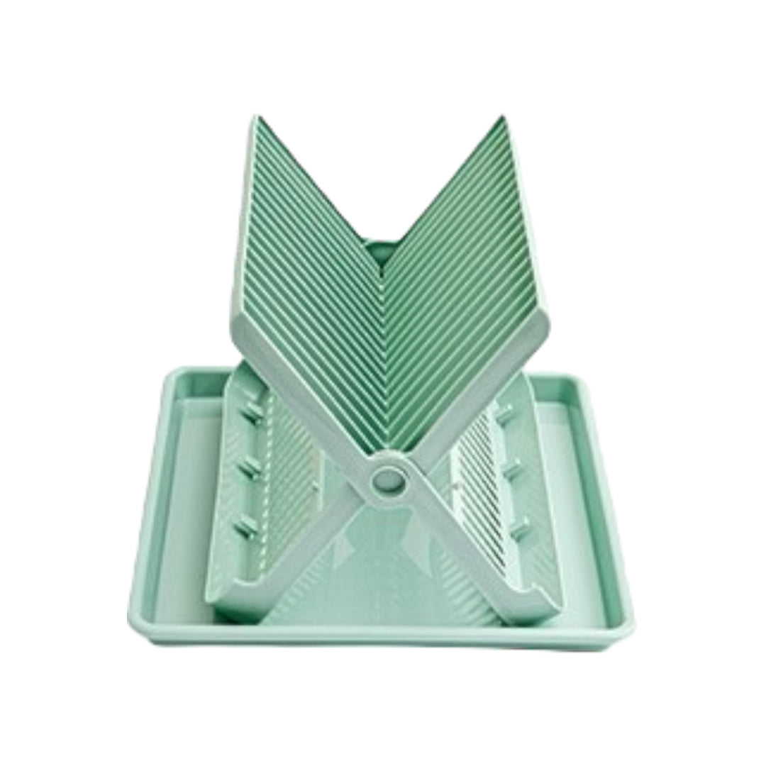 Compact folding dish drainer with tray designed for caravans, motorhomes, and compact kitchens