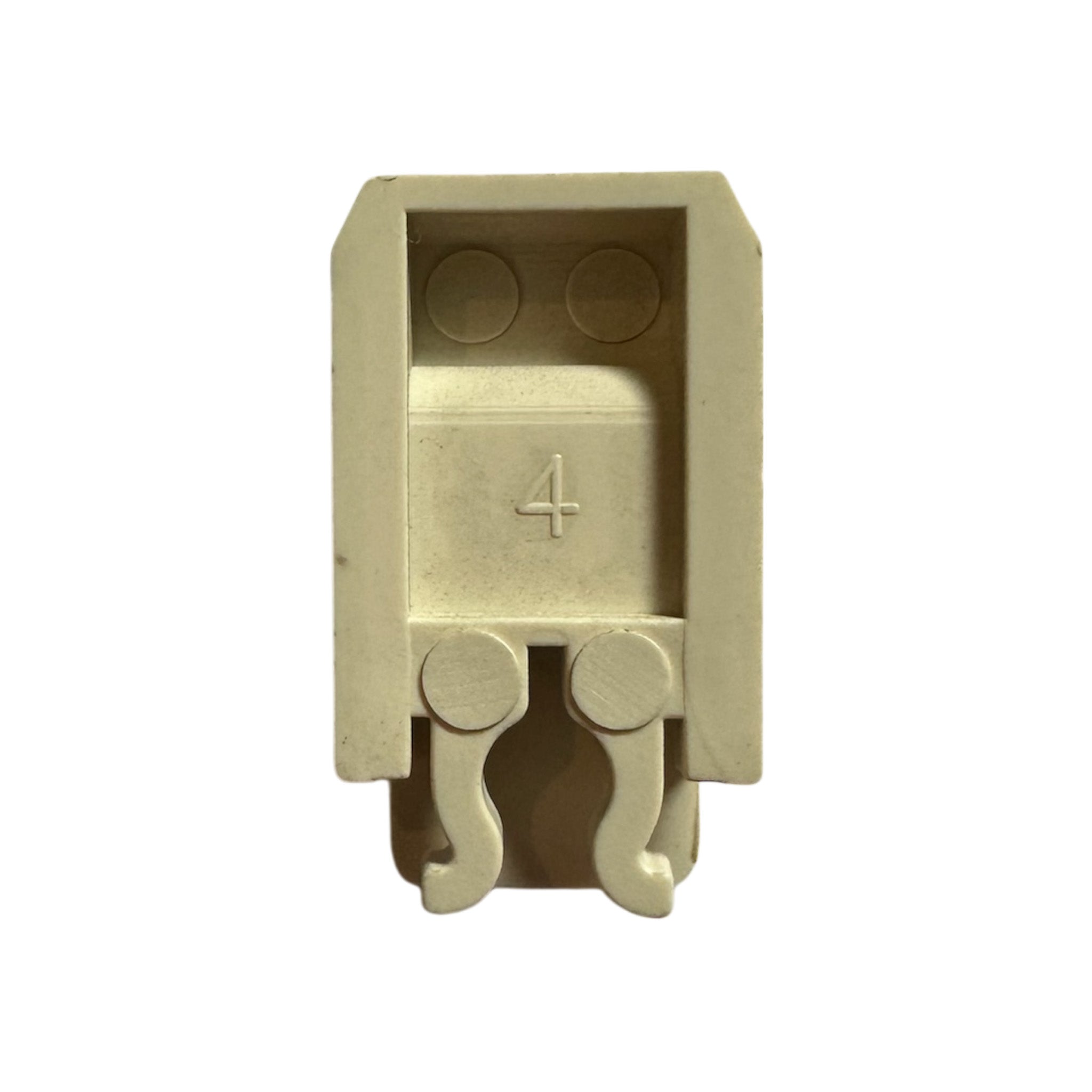 Cream Dometic fridge vent clip to secure ventilation panels in external frames