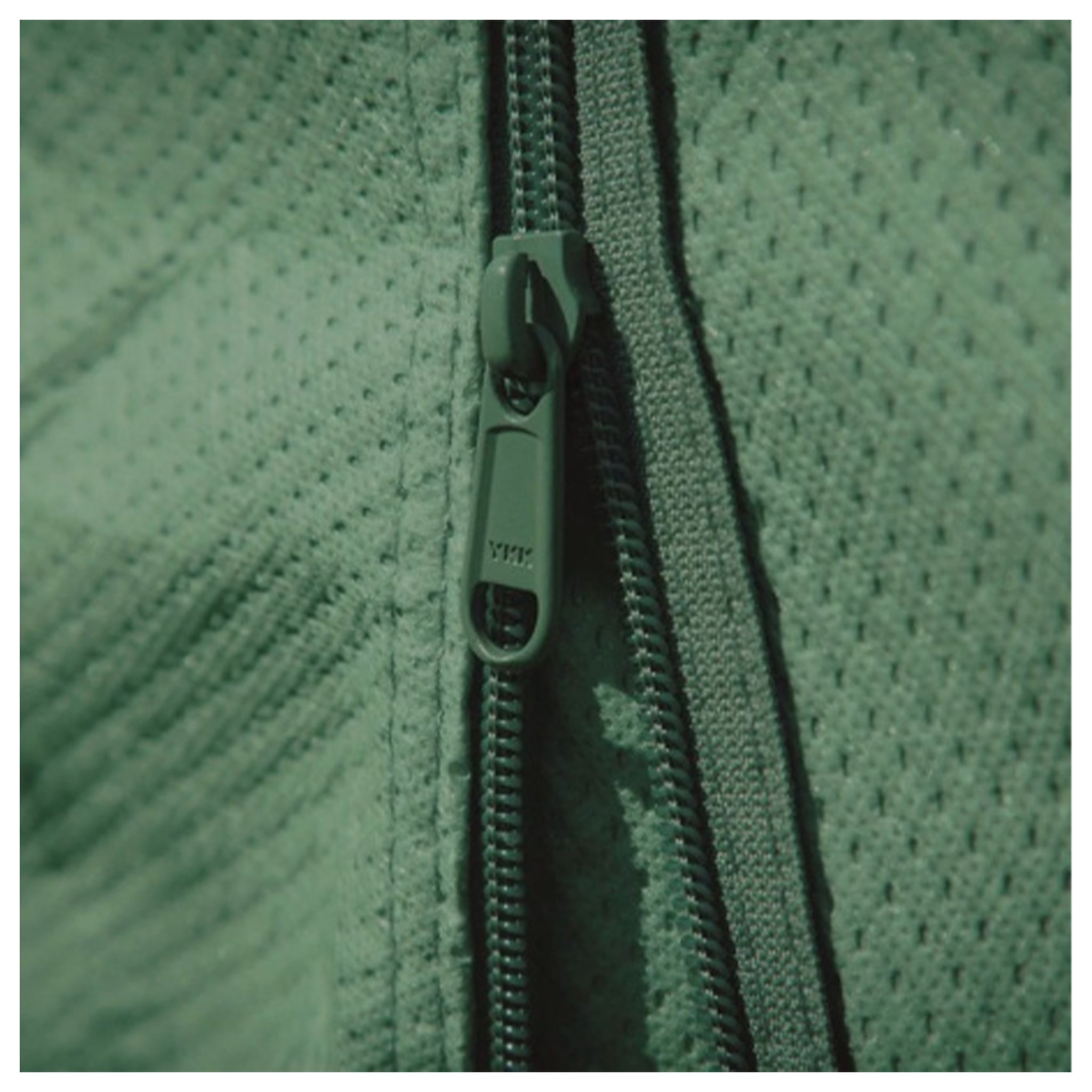 HTD caravan cover showing zip access panels and included storage bag