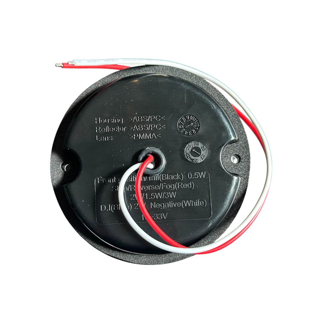 Waterproof Luxvision 95mm round reverse light for caravan, motorhome, and trailer use, LED with clear lens and long-lasting performance