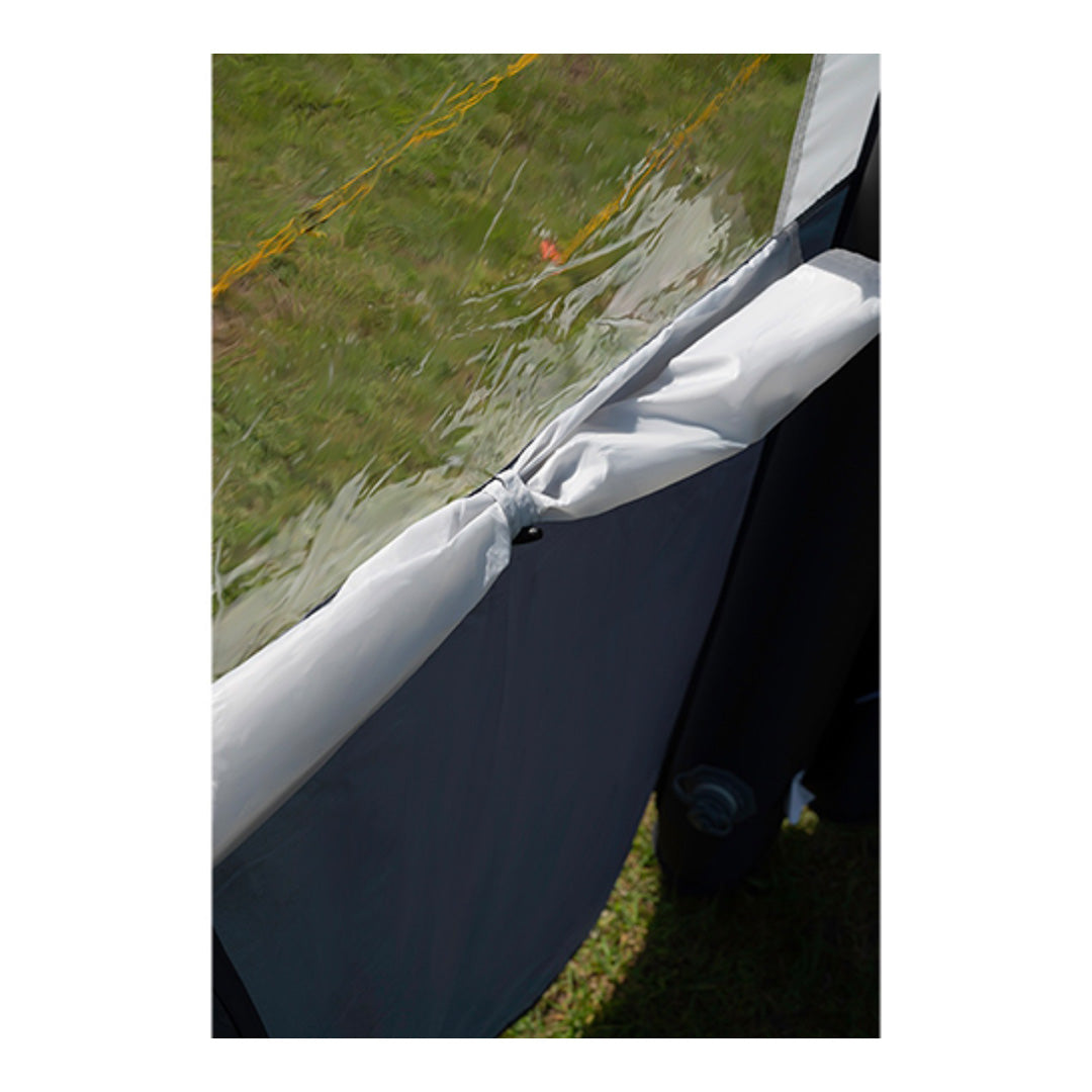 Camping air windbreak with Kadar strip, pump, and guy ropes