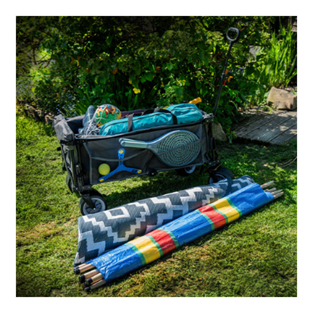 Maypole Easy Load XL camping cart in use in garden with 80kg capacity