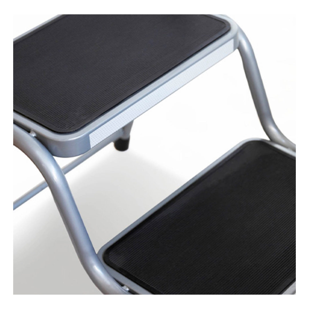 Two-step entry platform with soft grip handle and rubber tread plates