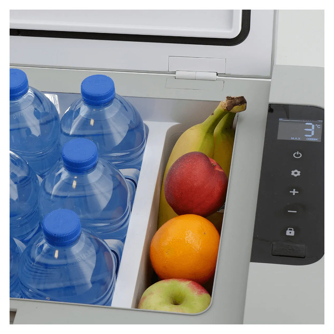 Inside view of Mestic MCC-35 showing separate compartments for drinks bottles and fresh fruit