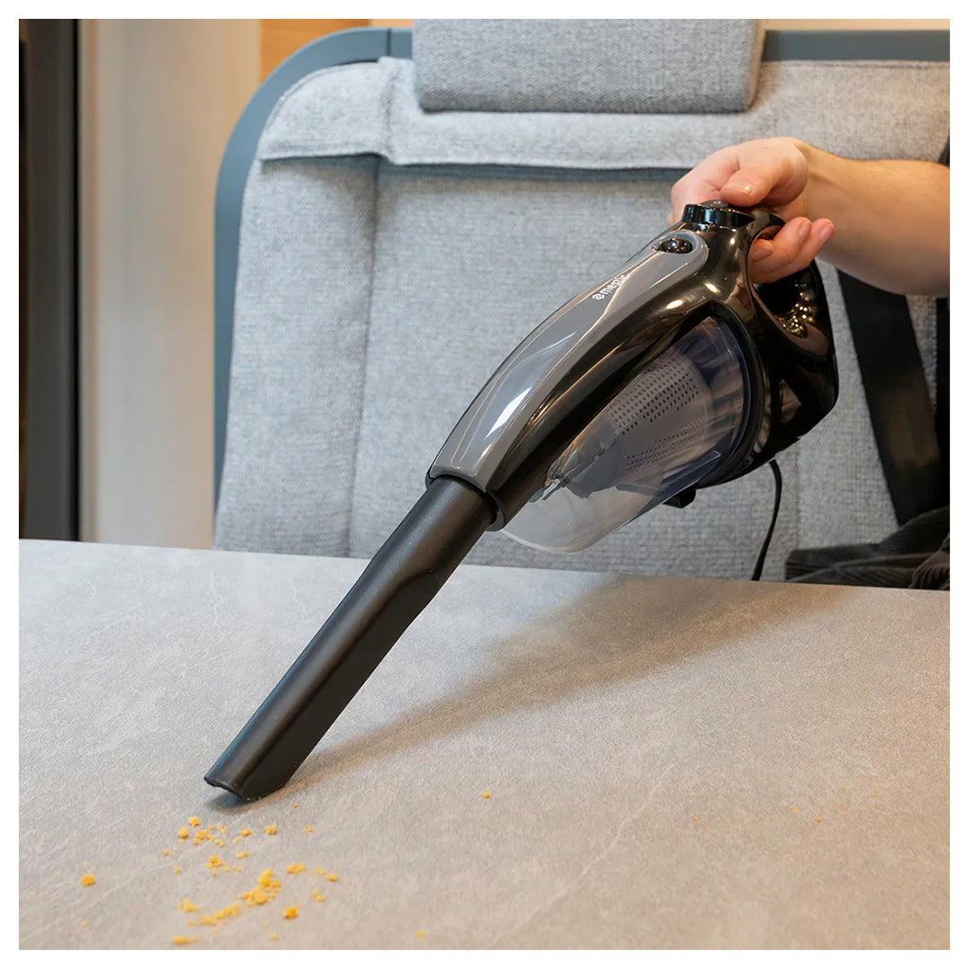 Mestic MS-80 12V vacuum cleaner cleaning a caravan or motorhome interior