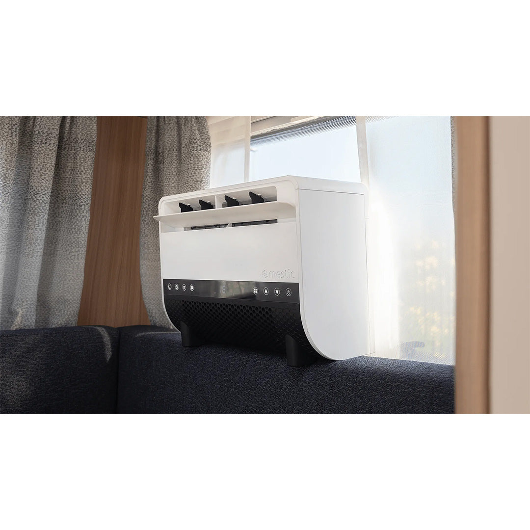 Mestic SPA-3100 split air conditioning indoor unit installed in a caravan living area